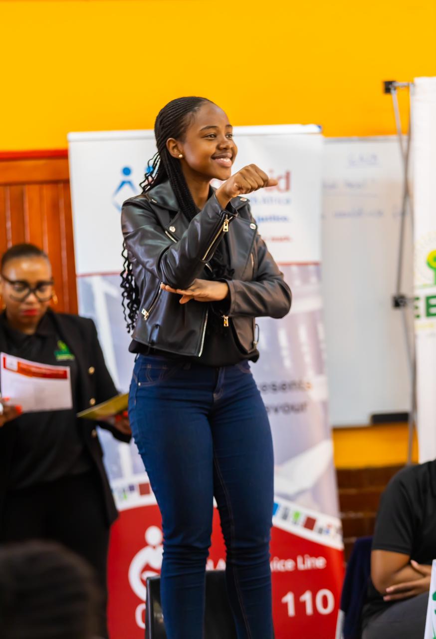 The Deaf Coordinator and Spokesperson for the Neema Foundation, Mariah Morgan addressing the attendees at the workshop in Soshanguve.