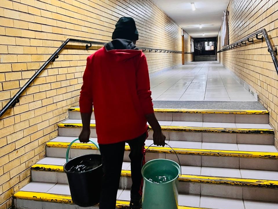 An employee at the Johannesburg Society for the Blind delivers hot water to the blind residents. Photo supplied by JSB An employee at the Johannesburg Society for the Blind delivers hot water to the blind residents. Photo supplied by JSB